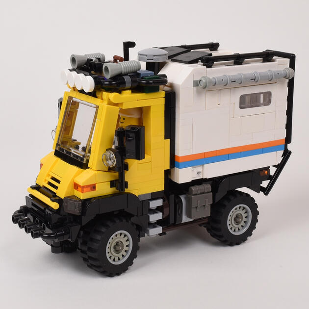 Expedition Unimog - With the goal of designing the ultimate all-terrain home on wheels, this is the third in my series of Unimogs. The living quarters include bench seating that converts to a bed, a bathroom, and a kitchen. More views below. (608 parts)