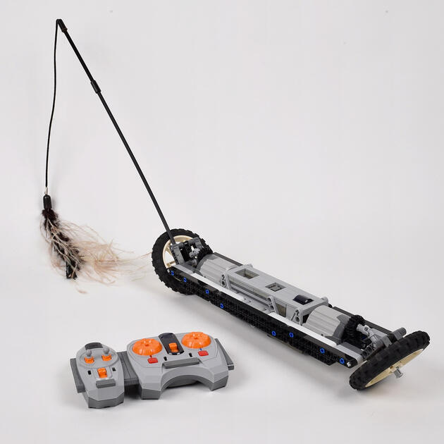 Cat Toy - Using power functions, this remote controlled two wheeler is made for entertaining cats. Mounting the wheels at an angle allows it to stay upright.