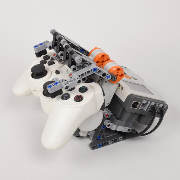 Credit Accumulator NXT Bot - Designed to accumulate virtual funds for purchasing cars in Gran Turismo 5, this bot presses buttons on a PlayStation 3 controller in a timed sequence to restart races in B-Spec Mode continuously.