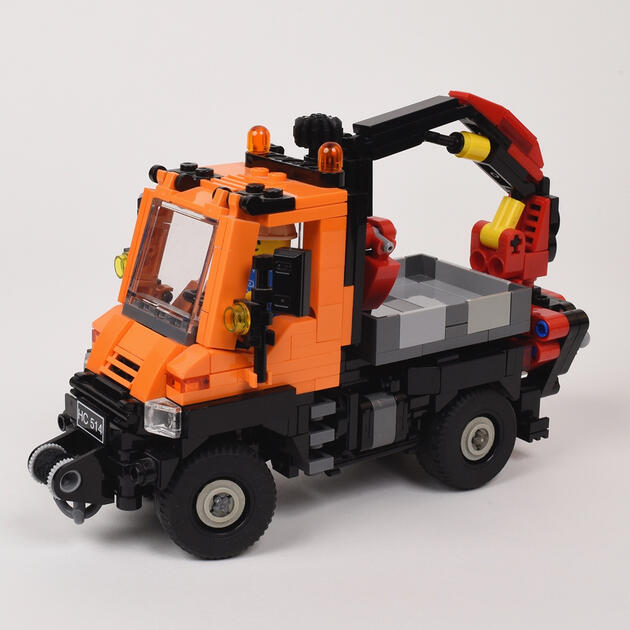 Minifig Scale Unimog U 400 - Inspired by Technic set 8110, I created a smaller version with a working steering mechanism. This model evolved naturally, giving me the sense of discovering what it "wanted" to be. More links below.